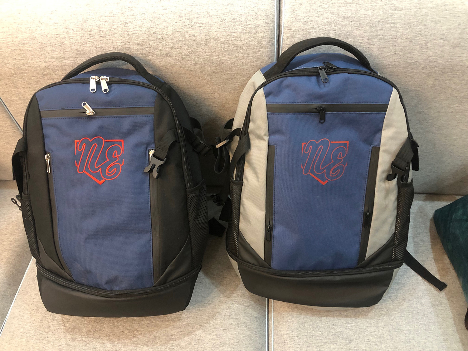 Two customized Rango Sports Walrus-Packs with a club baseball team logo