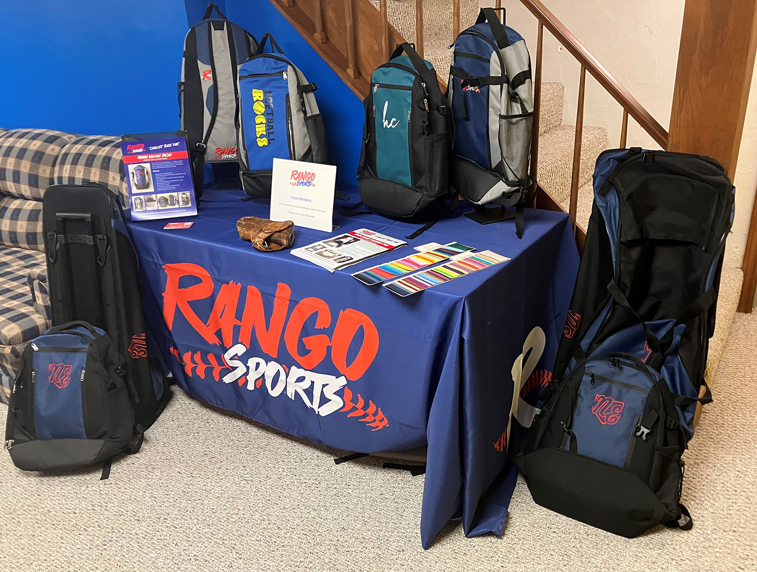 The Rango Sports booth set up in a basement