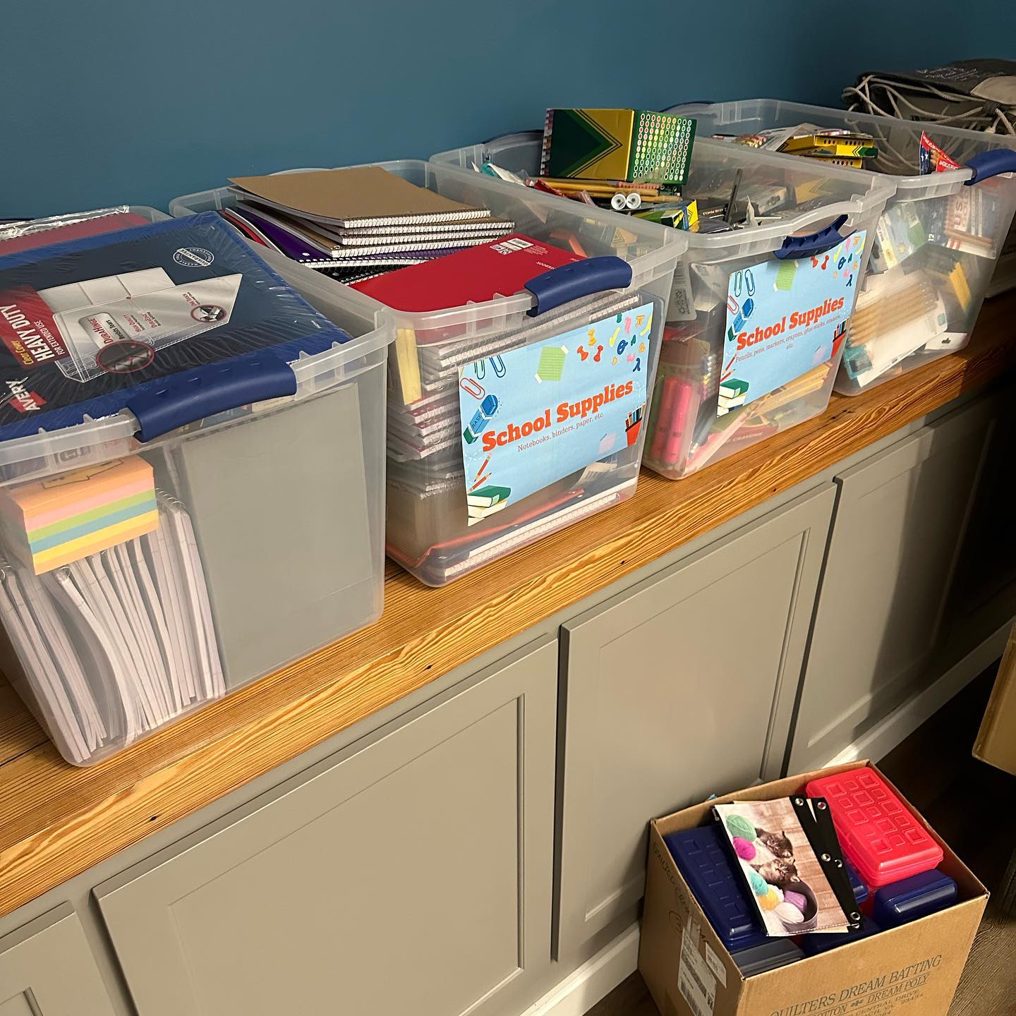 Close-up of school supplies being delivered to Hope Chapel by Rango Sports