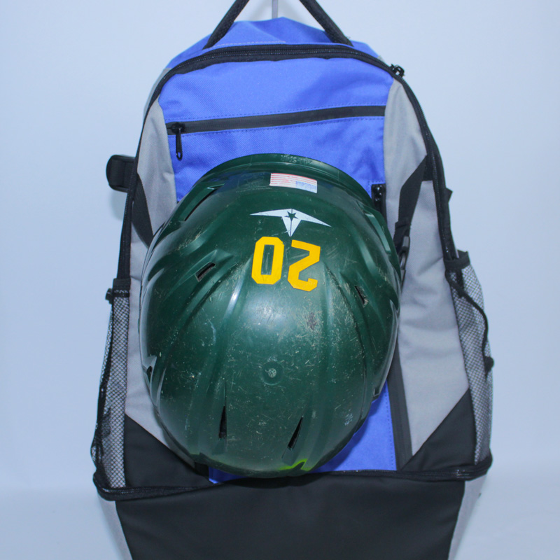 Rango Sports Walrus-Pack demonstrating the secure helmet strap using a green helmet