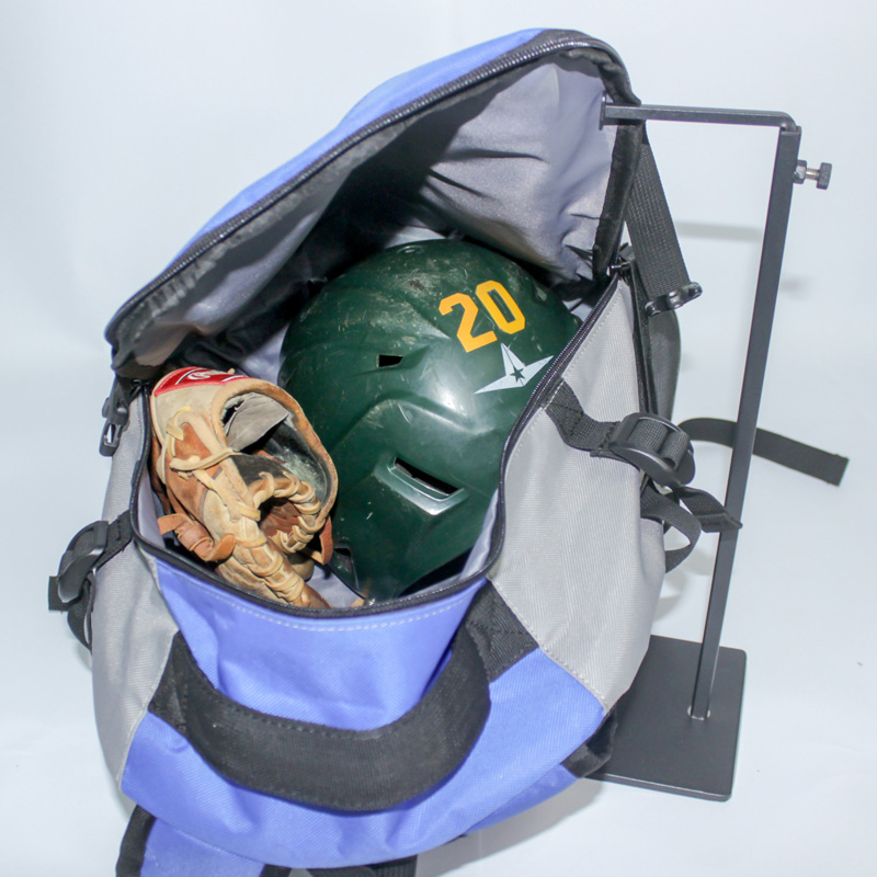 Spacious main compartment of Rango Sports Walrus-Pack for storing gear, full with a helmet and glove