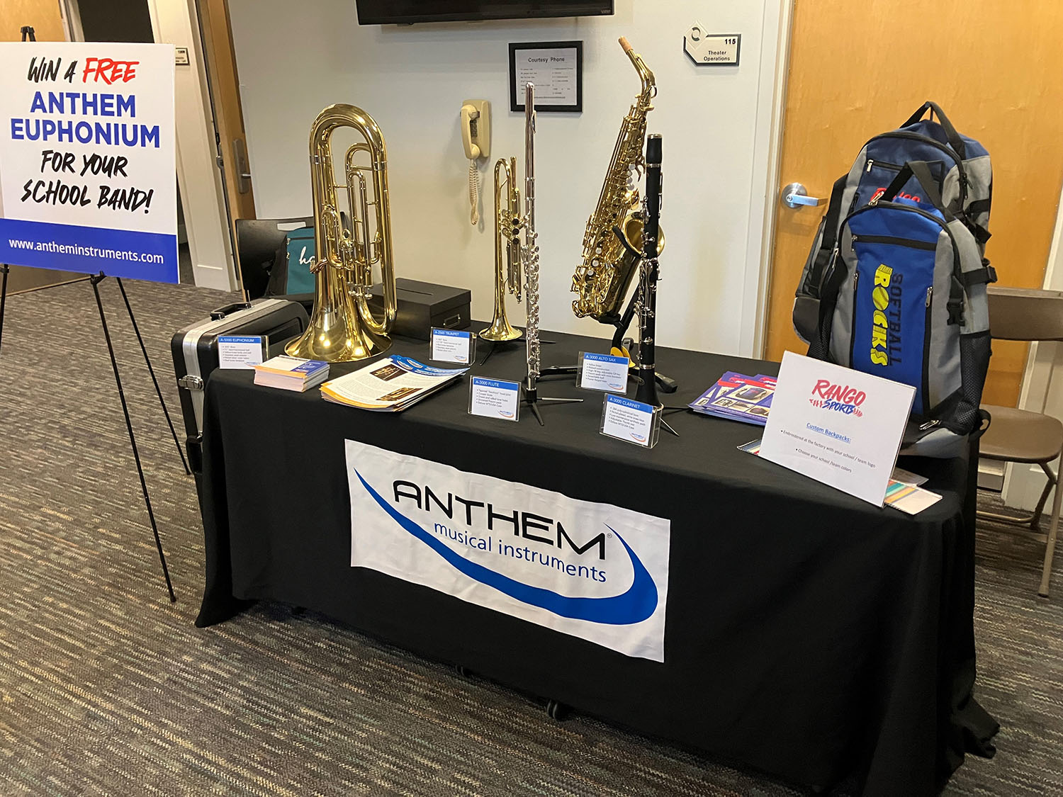 An Anthem Musical Instruments booth at the UMaine Band Director Festival, where Rango Sports was given a section of the table to advertise products